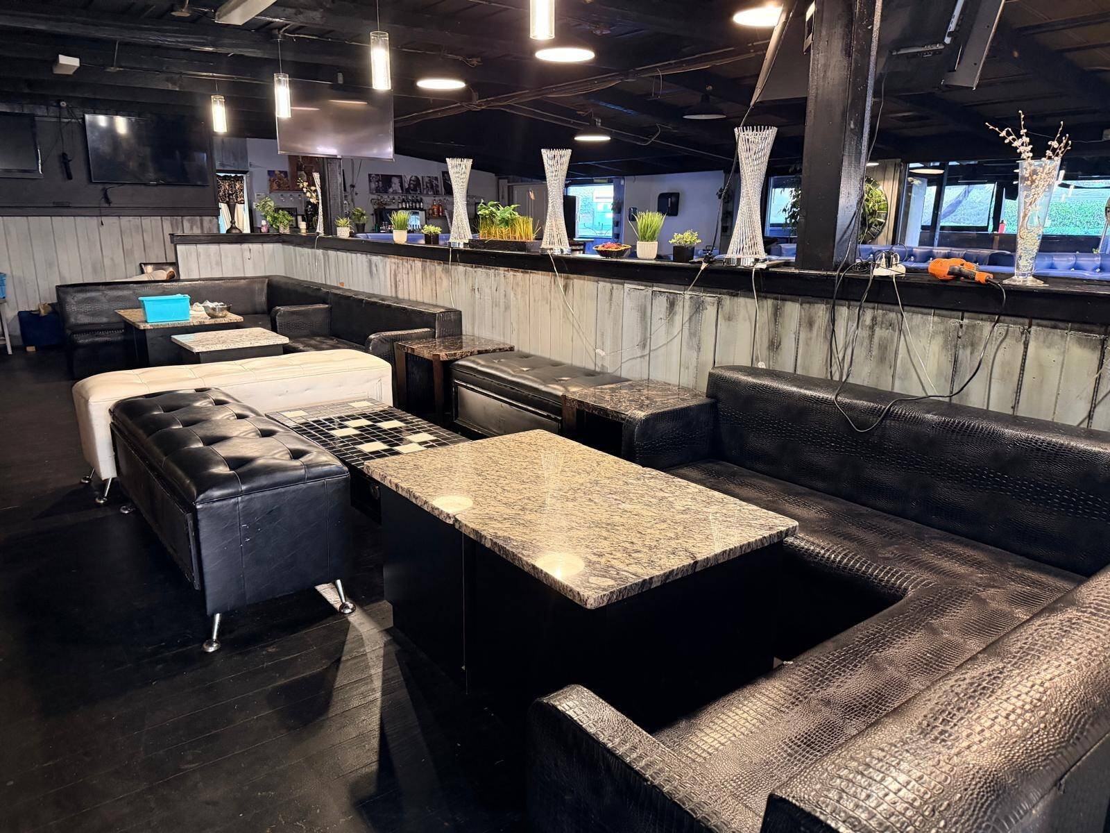 Blue lounge seating inside Nations Rhythm